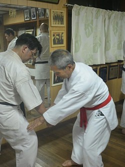 Receiving instructions from Maeshiro Morinobu, Hanshi - President of Okinawa Shorinryu Karatedo Kyokai